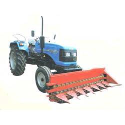 Tractor mounted reaper
