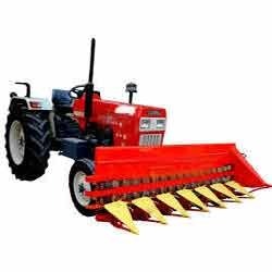Tractor mounted reaper